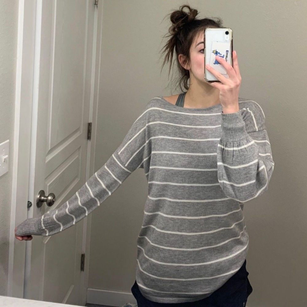 Gray striped philosophy sweater. Size small but can fit medium.